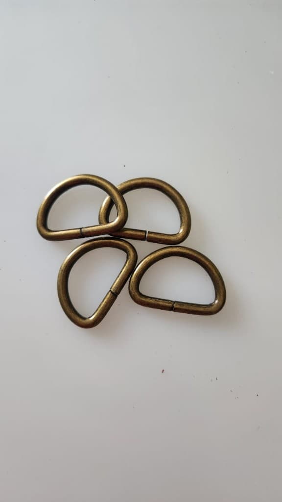 Antique brass D-rings by Plaasjaap